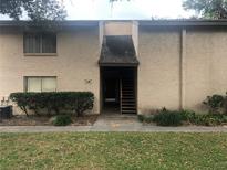 Charming condo with a private entrance and well-maintained landscaping in a desirable location at 7507 Presley Pl # D, Tampa, FL 33617