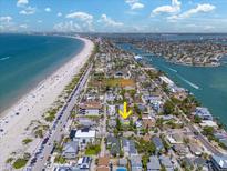 Desirable location near the beach, this property offers coastal living at its finest at 107 13Th Ave, St Pete Beach, FL 33706