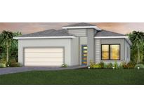 Charming single-Gathering home with a modern design, well-maintained lawn, and attached two-car garage at 4951 Ribbon Rock Cv, Lakewood Ranch, FL 34211
