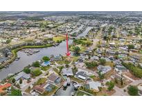 Aerial view of waterfront property with boat dock, canals, and easy access to the Gulf at 6357 Spanish Main Dr, Apollo Beach, FL 33572
