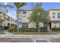 Charming two-story home featuring well-maintained landscaping and a welcoming facade, perfect for families at 12937 Trade Port Pl, Riverview, FL 33579