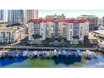 Beautiful condominium building features a marina, waterfront access, and a community pool at 700 S Harbour Island Blvd # 143, Tampa, FL 33602