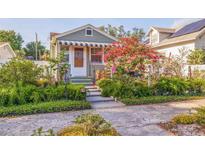 Charming home featuring a beautifully landscaped front yard and welcoming entrance at 4426 3Rd N Ave, St Petersburg, FL 33713