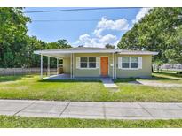 Charming single-story home with a covered porch and well-maintained lawn at 1601 24Th S St, St Petersburg, FL 33712