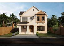 Charming two-story home with a mix of light brick and siding and mature landscaping at 921 12Th N St, St Petersburg, FL 33705