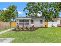 Charming single story home with lush green lawn and appealing landscaping at 4561 21St S Ave, St Petersburg, FL 33711