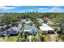 Charming neighborhood homes with lush landscaping and stunning downtown St. Petersburg skyline views at 136 30Th N Ave, St Petersburg, FL 33704