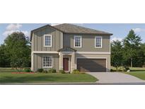 Charming two-story home with a well-manicured lawn and attached two-car garage in a tranquil neighborhood at 1814 Tropical Oasis Ave, Plant City, FL 33565