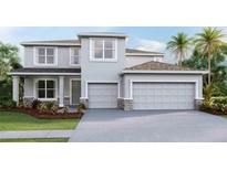 Two-story home features a modern design, gray color palette, two-car garage, and manicured landscaping at 19681 Gladeview Way, Land O Lakes, FL 34638