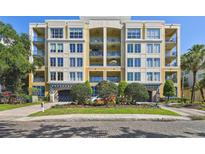 A lovely five-story condo building with decorative balconies and an inviting entrance at 509 W Bay St # 103, Tampa, FL 33606