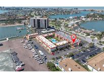 Waterfront condo complex with boat docks, pool, and beautiful bay views for a relaxing Florida lifestyle at 10365 Paradise Blvd # 4, Treasure Island, FL 33706