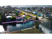 Waterfront property with canal access featuring 42 acres, dock, and convenient access to nearby amenities at 13930 King Ave, Hudson, FL 34669