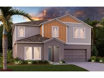Charming two-story home with a neutral color palette, manicured lawn, and a two car garage at 14773 Summer Branch Dr, Lithia, FL 33547