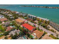 Gorgeous aerial view of the condo near the intercoastal waterway and a community of waterfront homes at 357 8Th N Ave # 3, Tierra Verde, FL 33715