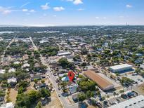 An aerial view showcases the neighborhood and proximity to the water at 439 E Boyer St, Tarpon Springs, FL 34689