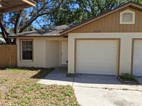 Charming one-story home featuring an attached garage and neatly maintained landscaping at 3625 Simcoe Ct, Palm Harbor, FL 34684