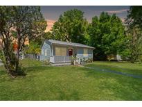 Charming single-story home with a well-manicured lawn and inviting front porch at 2751 36Th N Ave, St Petersburg, FL 33713
