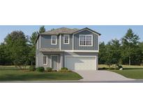 Charming two-story home featuring a two-car garage and well-manicured lawn at 8448 Sea Ray Run, Parrish, FL 34219