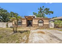 Charming single-story home featuring a decorative stone facade and well-manicured landscaping at 3443 16Th Ave S, St Petersburg, FL 33711