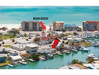 Wonderful waterfront living featuring a spacious home with private boat dock and easy beach access at 248 137Th Cir, Madeira Beach, FL 33708