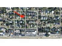 Overhead street view shows neighborhood with tree-lined streets and nearby shopping and dining at 4013 W North B St, Tampa, FL 33609