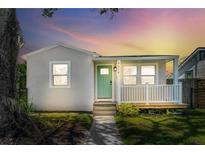 Charming single-story home featuring a cozy front porch, neat landscaping, and a freshly painted exterior at 4516 21St N St, St Petersburg, FL 33714