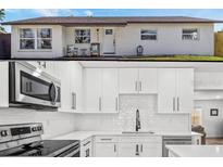 Charming single-story home with well-maintained lawn and inviting front porch seating at 8240 Jacaranda Ave, Seminole, FL 33777