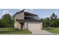 Charming two-story home with a two-car garage, stone accents, and professionally landscaped yard at 11543 71St E Ave, Palmetto, FL 34221