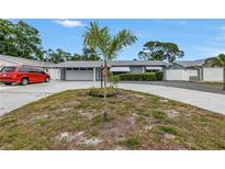 Charming single-story home with a well-maintained front yard and inviting curb appeal on a sunny day at 11315 86Th Ave, Seminole, FL 33772