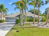 Charming single story home with well-manicured lawn and mature landscaping at 26180 Deep Creek Blvd, Punta Gorda, FL 33983