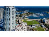 Breathtaking aerial view of the condo with water views and marina, showing the building's prime waterfront location at 301 1St S St # 3004, St Petersburg, FL 33701