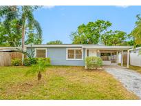 Charming single-story home featuring a well-maintained front yard and a covered front entrance at 1113 53Rd S St, Gulfport, FL 33707