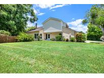 Charming home featuring a large, well-manicured front yard and inviting curb appeal at 13902 Bardmoor Pl # B, Tampa, FL 33618