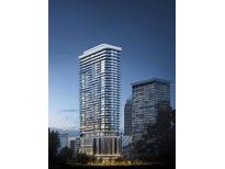 Modern high-rise condo building featuring sleek architectural design and expansive glass windows at 520 N Tampa St # 3001, Tampa, FL 33602