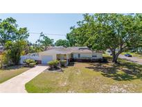 Beautiful single-story home featuring a well-kept lawn and cozy carport at 226 75Th N St, St Petersburg, FL 33710