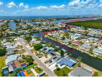Waterfront community aerial view with property location with water access to the ocean at 1011 Spindle Palm Way, Apollo Beach, FL 33572