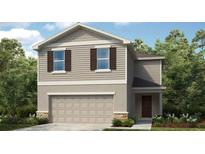 Charming two-story home boasts a two-car garage, complemented by lovely landscaping and neutral tones at 12400 Gust Ct, Hudson, FL 34669