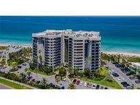 Stunning beachfront condo building with lush landscaping, private parking, and breathtaking ocean views at 1600 Gulf Blvd # 212, Clearwater Beach, FL 33767