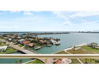 Stunning water views from a condo featuring lush landscaping and waterfront homes at 4900 Brittany S Dr # 1414, St Petersburg, FL 33715