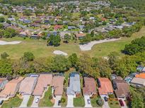 Lovely homes surround the beautiful golf course with mature trees and manicured lawns at 9375 French Quarters Cir, Weeki Wachee, FL 34613