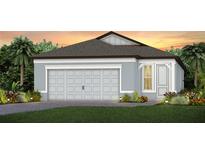 Charming single-story home with a two-car garage and well-manicured lawn at 9478 Shorebird Ct, Parrish, FL 34219