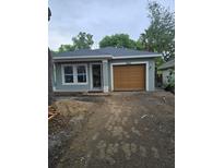 Single-story home featuring a one-car garage, neutral color scheme, and newly installed windows at 304 4Th Sw Ave, Largo, FL 33770
