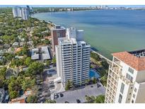 Stunning aerial view of the high rise and surrounding community featuring water views at 4141 Bayshore Blvd # 1204, Tampa, FL 33611