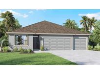 Charming single-story home with a two-car garage and lush landscaping at 1457 Brown Mallet Pl, Ruskin, FL 33570