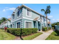 Charming townhome featuring a well-maintained exterior, lush landscaping, and a welcoming entrance at 1601 Fluorshire Dr, Brandon, FL 33511