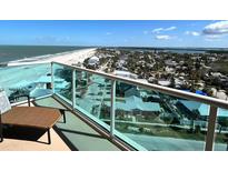 Relaxing balcony seating with Gulf views and ocean breeze at 880 Mandalay Ave # N1004, Clearwater Beach, FL 33767