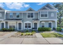 Charming townhome featuring a well-maintained facade, neat landscaping, and a welcoming entrance at 2362 Lake Woodberry Cir, Brandon, FL 33510