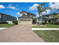 Charming two-story home featuring a two car garage and well-maintained landscaping at 19796 Long Lake Ranch Blvd, Lutz, FL 33558