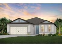 Charming one-story home featuring a two-car garage, well manicured lawn and tasteful landscaping at 9749 Redwood Heights Loop, Thonotosassa, FL 33592