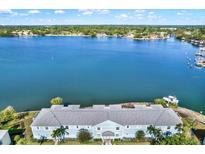 Stunning aerial view of waterfront property, showcasing its beautiful architecture and serene coastal setting at 5007 Starfish Se Dr # A, St Petersburg, FL 33705